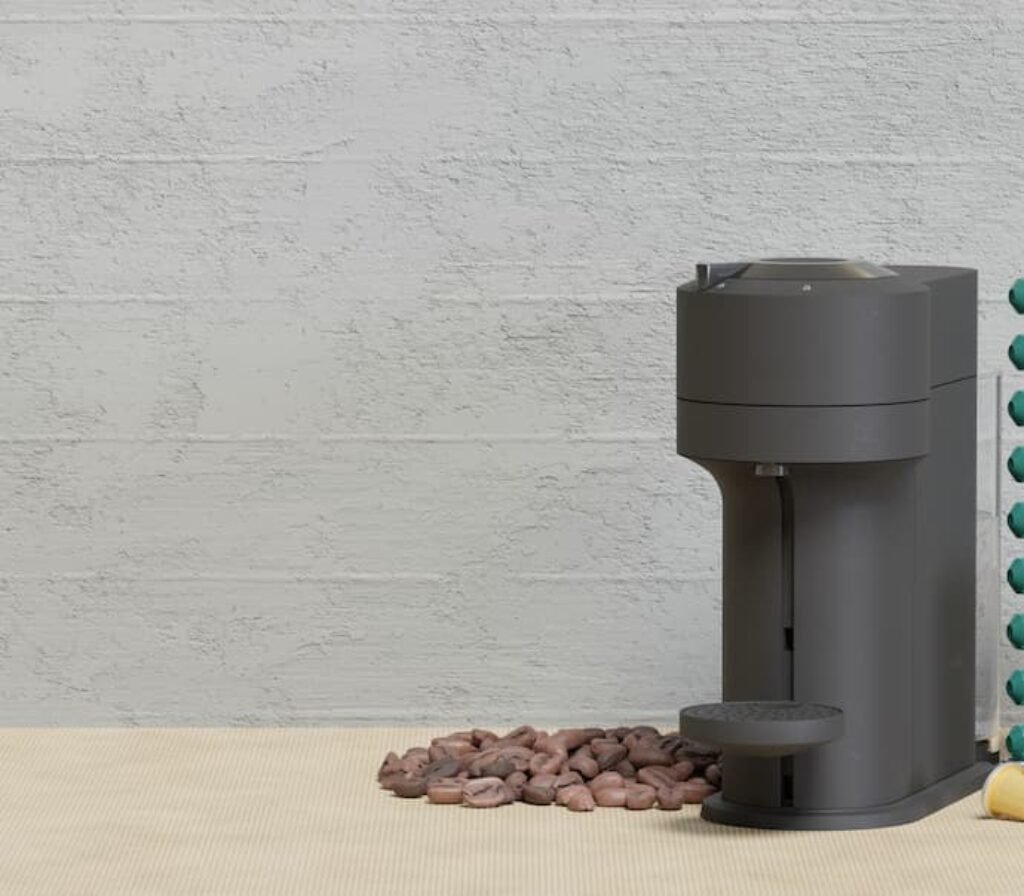 Uma cafeteira Dolce Gusto moderna em cima de uma mesa.
